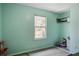 Bedroom with window, green walls and hardwood floors at 311 Macgregor Dr, Summerville, SC 29486