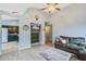 Open-concept living room featuring a ceiling fan, modern flooring, and a TV at 311 Macgregor Dr, Summerville, SC 29486