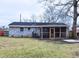 The backyard features a fenced yard, screened porch and a brick home at 338 Holly Ave, Goose Creek, SC 29445
