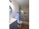 Beautiful bathroom featuring tiled shower with glass and gray vanity at 338 Holly Ave, Goose Creek, SC 29445