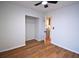 A clean bedroom with hardwood floors and natural light coming in from a door on the far wall at 338 Holly Ave, Goose Creek, SC 29445