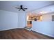 Bright living room showcasing open floor plan with hardwood floors and modern finishes at 338 Holly Ave, Goose Creek, SC 29445