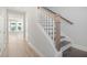 Elegant staircase with wood and white painted accents, leading to the upper level at 349 Chapman Cir, Goose Creek, SC 29445