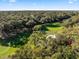 Scenic aerial view of the surrounding neighborhood and lush greenery, showcasing a private setting at 385 Green Winged Teal Rd, Kiawah Island, SC 29455