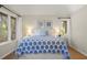 Bright bedroom with two bedside tables and a coastal theme with artwork at 385 Green Winged Teal Rd, Kiawah Island, SC 29455