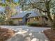 A single-Gathering home featuring an inviting, landscaped front yard and private driveway at 385 Green Winged Teal Rd, Kiawah Island, SC 29455