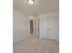 Bedroom with neutral carpet, closet, and view to hallway at 404 Duskywing Dr, Goose Creek, SC 29445