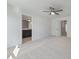 Bedroom featuring carpet, ceiling fan, and entry to bathroom at 404 Duskywing Dr, Goose Creek, SC 29445