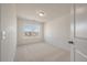 Bright bedroom with neutral carpeting and a window offering natural light at 404 Duskywing Dr, Goose Creek, SC 29445
