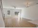Bright living room featuring hardwood floors and sliding glass doors at 404 Duskywing Dr, Goose Creek, SC 29445