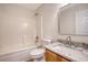Bright bathroom featuring tile surround, modern fixtures and wooden cabinets at 412 Hainesworth Dr, Charleston, SC 29414