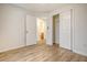 The bedroom features light wood floors, a closet and a doorway into the bathroom at 412 Hainesworth Dr, Charleston, SC 29414