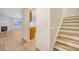 Welcoming entryway with hardwood floors that provides access to the living room and kitchen at 412 Hainesworth Dr, Charleston, SC 29414