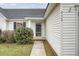 Close-up of the front door and house number of a home with classic siding and landscaping at 412 Hainesworth Dr, Charleston, SC 29414