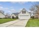 Charming single-story home with a two-car garage, well-manicured lawn, and classic curb appeal at 412 Hainesworth Dr, Charleston, SC 29414