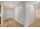 The hallway boasts new flooring and leads to the front door and other rooms at 412 Hainesworth Dr, Charleston, SC 29414