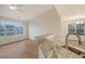 The kitchen overlooks a sunlit eat-in area with large windows and backyard views at 412 Hainesworth Dr, Charleston, SC 29414