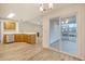 Open kitchen showcasing stainless steel appliances, bar counter seating and views into living areas at 412 Hainesworth Dr, Charleston, SC 29414
