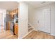 Functional kitchen space with modern appliances, wood cabinets, and easy access to the staircase at 412 Hainesworth Dr, Charleston, SC 29414