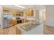 Well-lit kitchen with stainless steel appliances, granite countertops, and wood cabinets at 412 Hainesworth Dr, Charleston, SC 29414