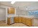 Well-equipped kitchen features ample counter space, stainless steel dishwasher, and wood cabinets at 412 Hainesworth Dr, Charleston, SC 29414