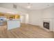 Spacious living area with fireplace, hardwood floors, and open access to the modern kitchen at 412 Hainesworth Dr, Charleston, SC 29414