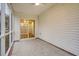 Covered screened in patio with view into room at 412 Hainesworth Dr, Charleston, SC 29414