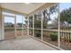 Screened in porch with views of pond at 412 Hainesworth Dr, Charleston, SC 29414