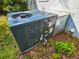 Amana AC unit sits in the yard outside the home at 422 Academy Rd, Walterboro, SC 29488