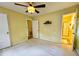 This spacious bedroom features a ceiling fan, closet, and an ensuite bathroom for extra convenience at 422 Academy Rd, Walterboro, SC 29488
