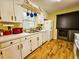 Kitchen view highlighting modern appliances, cabinetry, and stainless steel washer/dryer at 422 Academy Rd, Walterboro, SC 29488