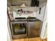 Closet featuring Whirlpool stainless steel washer and dryer with wire shelving at 422 Academy Rd, Walterboro, SC 29488