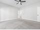 Spacious bedroom with neutral paint, carpeting, and a view of the kitchen at 4316 Cotton Flat Rd, Summerville, SC 29485