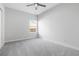 This bedroom is the perfect blank canvas for your design ideas, with neutral tones, cozy carpet, and bright natural light at 4316 Cotton Flat Rd, Summerville, SC 29485