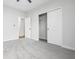 Spacious bedroom boasts neutral tones, plush carpeting, a large closet, and easy access to the en-suite bathroom at 4316 Cotton Flat Rd, Summerville, SC 29485