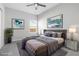 Comfortable bedroom features neutral tones, plush carpeting, stylish furnishings, and abundant natural light at 4316 Cotton Flat Rd, Summerville, SC 29485