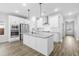 Bright kitchen with stainless steel appliances and a large center island at 4316 Cotton Flat Rd, Summerville, SC 29485
