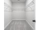 Walk-in closet features wire shelving, carpeting, and lots of storage space at 4316 Cotton Flat Rd, Summerville, SC 29485