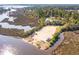 Aerial view of the community pool, boat parking, and waterfront at 4343 Ten Shillings Way, Ravenel, SC 29470