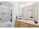 Clean bathroom featuring a single sink vanity and a shower-tub combination with white tile at 4343 Ten Shillings Way, Ravenel, SC 29470