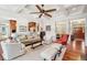 Spacious living room with hardwood floors, coffered ceiling, and an open floor plan at 4343 Ten Shillings Way, Ravenel, SC 29470