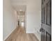 Inviting entryway with wood flooring, a dark front door, and a built-in bench at 447 Duskywing Dr, Goose Creek, SC 29445