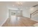 Bright living room featuring a ceiling fan, recessed lighting, and a staircase at 447 Duskywing Dr, Goose Creek, SC 29445