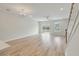 Spacious living room with a ceiling fan and a sliding glass door leading to the backyard at 447 Duskywing Dr, Goose Creek, SC 29445