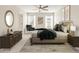Serene main bedroom showcasing a neutral palette, ceiling fan, and comfortable furnishings at 447 Duskywing Dr, Goose Creek, SC 29445