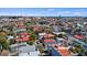 Charming Charleston single home boasts a vibrant red roof and overlooks a picturesque cityscape with a distant bridge view at 45 Bogard St, Charleston, SC 29403