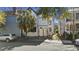 Charming two-story home with a fresh, light-blue facade, complemented by a mature palm tree and well-maintained front yard at 45 Bogard St, Charleston, SC 29403