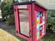 A whimsical community little library encourages reading and sharing of books at 4774 Linda St, North Charleston, SC 29405