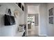 Welcoming entryway featuring stylish storage, decorative accents, and a glimpse into the dining area at 4877 Sound View Dr, Mount Pleasant, SC 29466