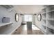 Spacious walk-in closet with custom shelving, natural light, and ample storage at 4877 Sound View Dr, Mount Pleasant, SC 29466